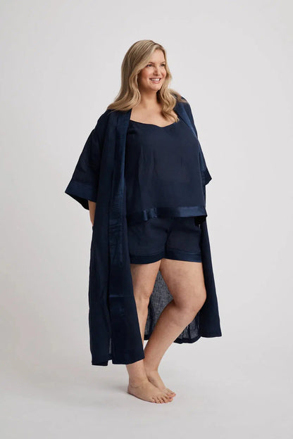 Woman wearing the long Anne linen robe in navy, lightweight cover-up inclusive sizes XS–4XL