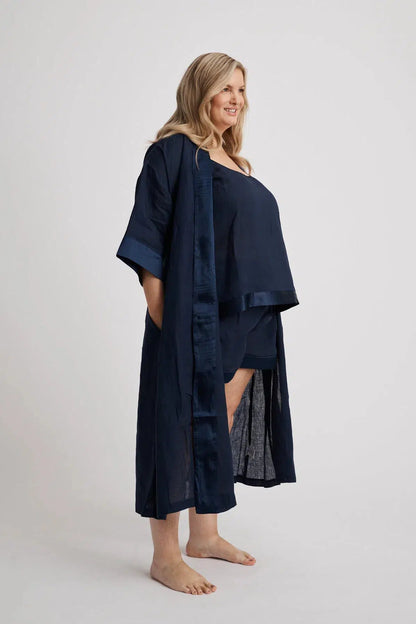 Woman wearing the long Anne linen robe in navy, lightweight cover-up inclusive sizes XS–4XL