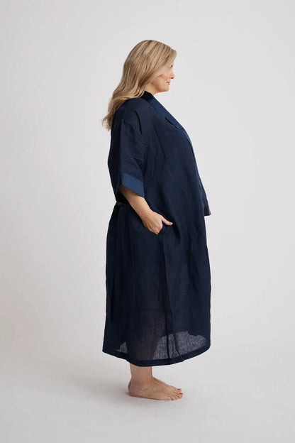 Woman wearing the long Anne linen robe in navy, lightweight cover-up inclusive sizes XS–4XL