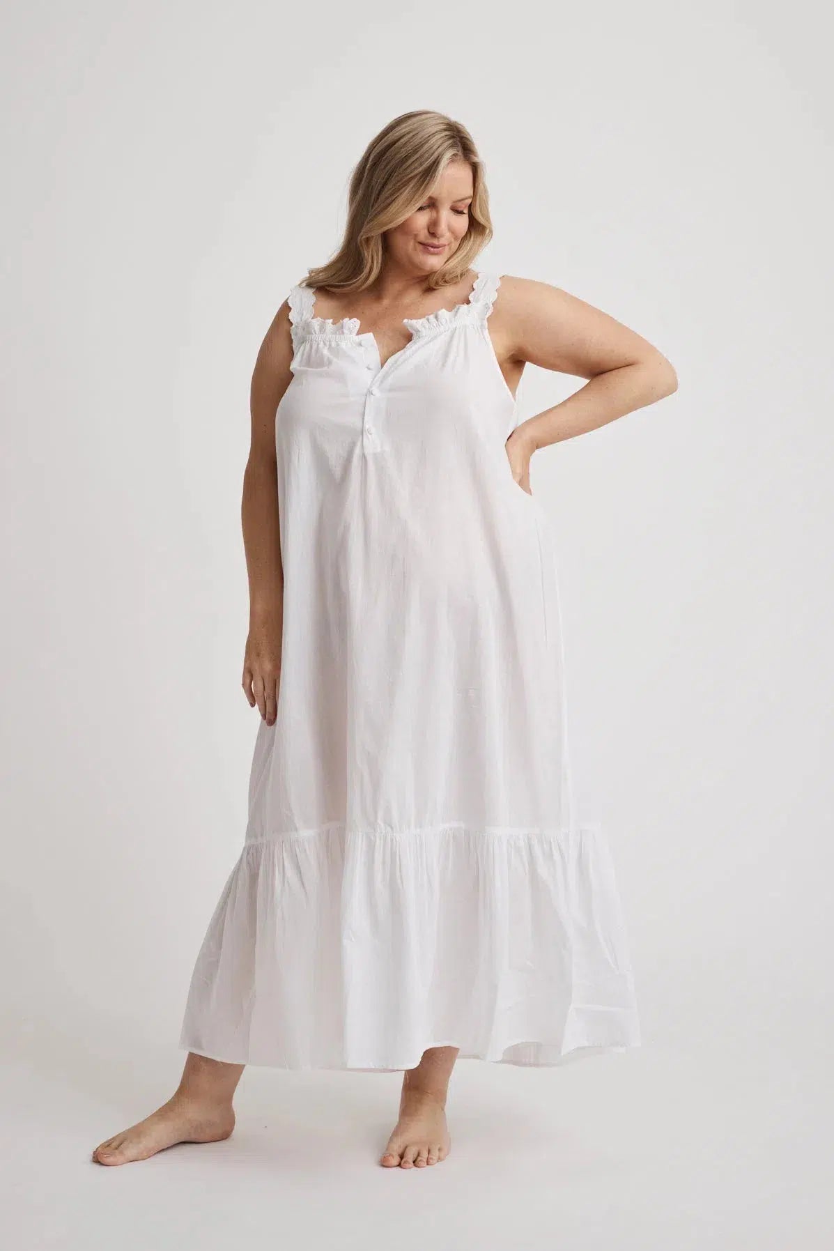 Woman wearing Lauren cotton button-front nightgown in white, inclusive sizes XS–4XL, ideal for hospital stays and recovery